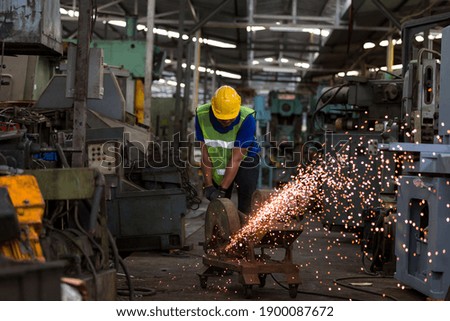 Image, Stock Photo The worker cuts the parquet on a circular saw