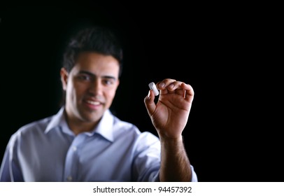 Male Writing Something On Glass Board