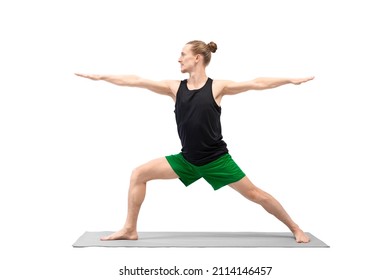 Male yoga, warrior II pose. Caucasian handsome man with bun hair practice Virabhadrasana, isolated on white. - Powered by Shutterstock