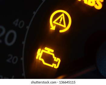 Malfunction or check engine car symbols, dash board close up