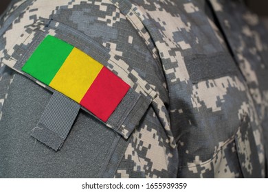 Mali Army Uniform Patch Flag On Soldiers Arm. Military Concept.