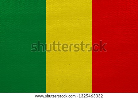 Mali flag on canvas. Patriotic background. National flag of Mali