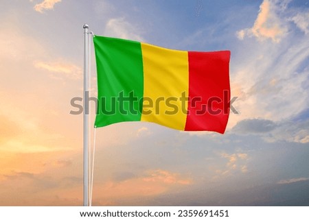 Mali flag waving on sundown sky