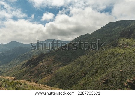 Malibu California Mountain Hiking Mishe Mokwa Trail With Green Hillside, Blue Sky With Clouds In A Nature Idealistic Landscape