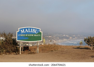 Malibu Sign And Foggy Eerie Coastline