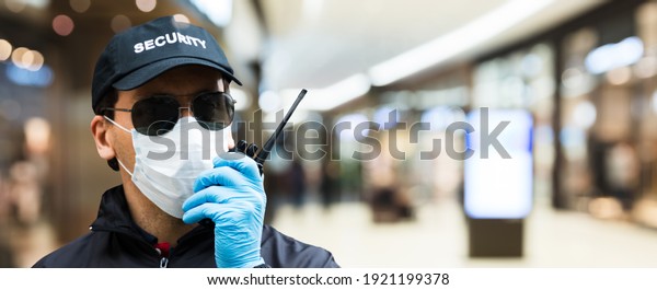 Mall\
Or Retail Store Security Guard Officer In Face\
Mask