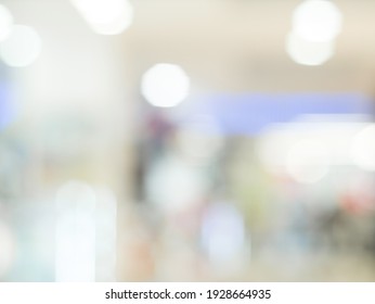 Mall store blurred background with bokeh. Defocused image for design template