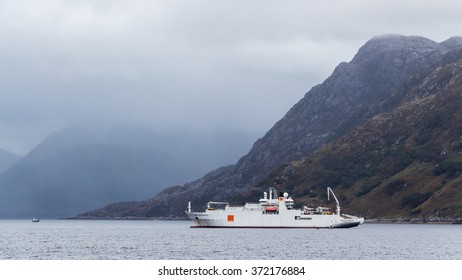 MALLAIG, HIGHLAND, SCOTLAND - SEPTEMBER 23, 2014: Orange Marine's cable ship Rene Descartes during laying operations around Outer Hebrides. Buried fiber optic aims to extend telecom networking range.