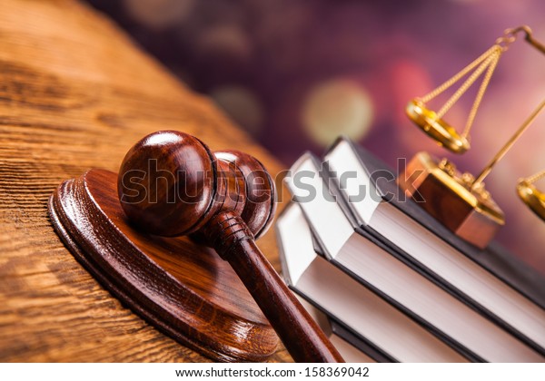Mallet, legal code and scales of justice. Law\
concept, studio shots