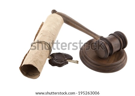 mallet and old paper on a white background