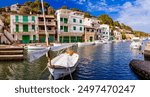 Mallorca (Majorca) island attractions and scenic places - traditional fishing village with typical wooden boats Cala Figuera. Spain summer holidays in Baleares