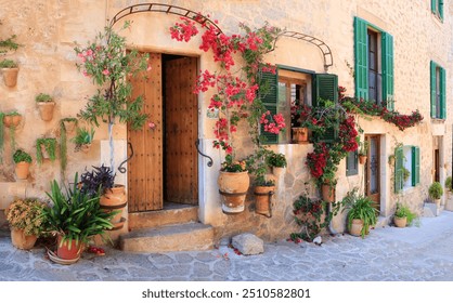 Mallorca (Majorca) island- traditional village Valldemossa with charming floral street decoration. Popular tourist attraction. Spain, Balearic islands