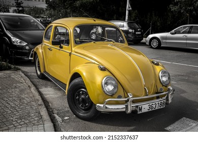 MALLORCA, SPAIN - Apr 25, 2018: A Vintage Yellow Volkswagen Beetle Car