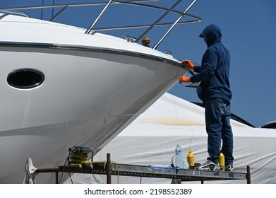 Mallorca, Spain - April 7, 2022: A Yacht Is Polished To A High Gloss In The Harbor