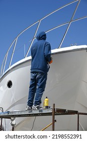 Mallorca, Spain - April 7, 2022: A Yacht Is Polished To A High Gloss In The Harbor