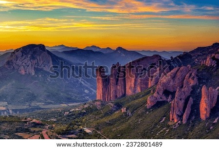Mallos de Riglos rocks at sunset, Huesca province, Aragon, Spain.