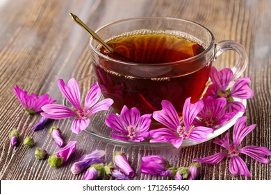 Mallow Herb And Mallow Flower Tea In Cup.