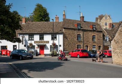  Malmesbury, Wiltshire, England, UK. 2020.  A Local Pub With A Red Door In The Lower Part Of This Old Market Town.