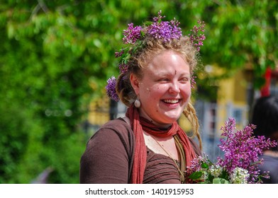 MALMO, SWEDEN - 29 MAY, 2010: A Swedish Girl At Midsummer With Flowers In Her Hair