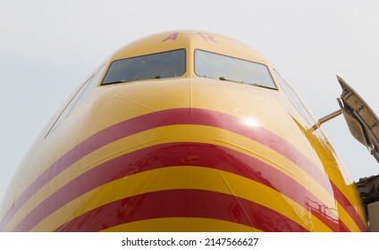 MALPENSA AIRPORT, ITALY - SEPTEMBER 14, 2021: DHL Boeing parked during load operations