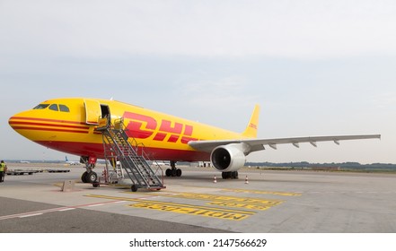 MALPENSA AIRPORT, ITALY - SEPTEMBER 14, 2021: DHL Boeing parked during load operations