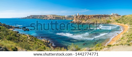 Malta. Beach. Ghajn tuffieha bay. Tropical resort. Maltese seashore. Panoramic landscape with beach and clear sky.