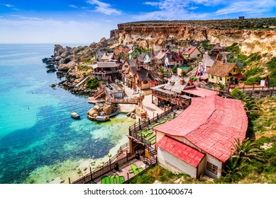 Malta, Il-Mellieha. View Of The Famous Village Mellieha And Bay On A Sunny Day