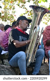 Maluku, Indonesia - 24 September 2022; A Man Playing A Bass Trumpet