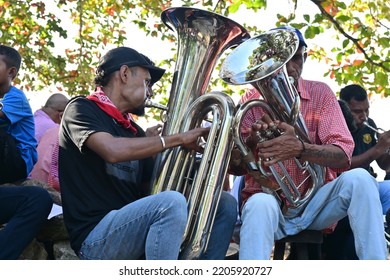 Maluku, Indonesia - 24 September 2022; Two Men Playing Bass Trumpet