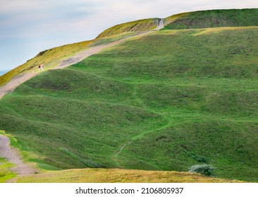 Malvern Hills,Worcestershire,England-June 01 2021:Visitors to this popular beauty spot,enjoy exercising and taking in the beautiful views from the various hilltops, on the 8 mile long range of hills.