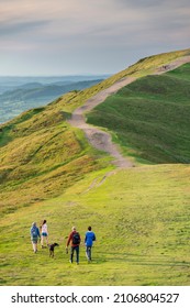 Malvern Worcestershire, England-June 01 2021:Visitors to this popular beauty spot,enjoy exercising and taking in the beautiful views from the various hilltops, around the 8 mile long range of hills.