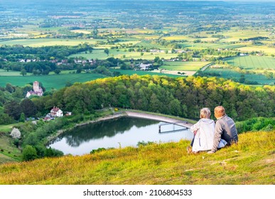 Malvern Worcestershire,England-June 01 2021:Visitors to this popular beauty spot,enjoy exercising and taking in the beautiful views from the various hilltops, around the 8 mile long range of hills.