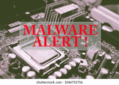 MALWARE ALERT!  texts on computer mother board for cyber security concept.