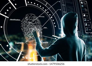 Malware and security concept with back view hacker pushing on fingerprint on digital screen with cyberspace icons.