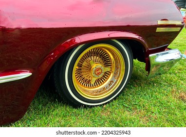 Mamaroneck, New York - September 11, 2022 - The Ornate Front Wheel Of A 1960s Chevrolet Low Rider Shown At The Kiwanis Club Car Show At Harbor Island Park.