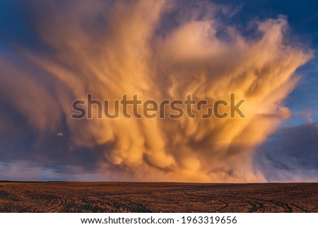 Mammatus clouds at sunset, dramatic storm clouds