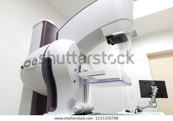 A mammogram machine with a computer work\
station in the radiology\
department