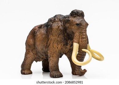 Mammoth figurine on white background
