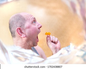 A Man Of 40-45 Years Old, Funny Eats Wide Open Mouth. Funny Facial Expressions. Quick Snack