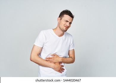 Man With Abdominal Pain Health Problem Discomfort Diarrhea Gray Background