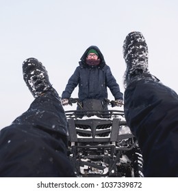 Man Accident In Atv Quad Bike. Winter Snow Field.