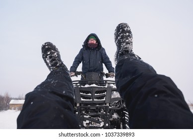 Man Accident In Atv Quad Bike. Winter Snow Field.