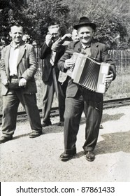 man with the accordion - photo scan, about 1950