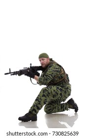 Man Actor In The Form Of An American Fur Seal Posing On A White Background. Special Forces In Vietnam, 1970's.