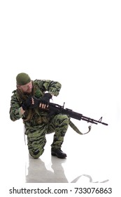 Man Actor In The Form Of An American Fur Seal Posing On A White Background. Special Forces In Vietnam, 1970's.