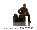 man actor in military uniform of a soldier of the Red Army of times World War II. photo made in the style of "low key"
