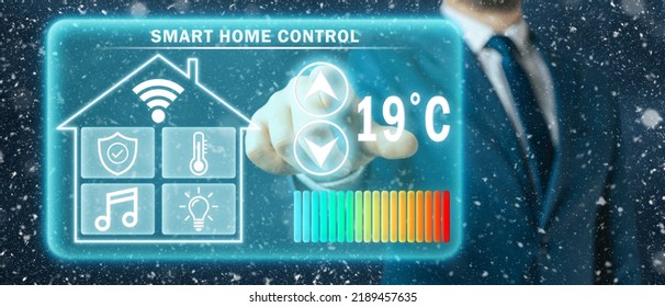 Man Adjusting Heating Temperature On A Virtual Screen Of Smart Home Controller, Winter Blizzard Background. Concept Of Forced Thrift Because Increased Price For Heating Home.