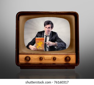 Man Advertising A Product On The Television