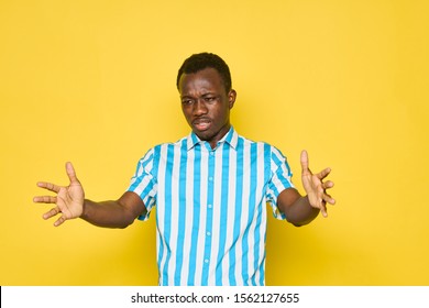 A man of African appearance gesture with his hands Studio lifestyle