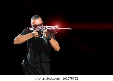 Man Aiming Assault Rifle Laser Sight